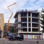 Sermac 36m concrete boom pump at working pumping to the 5th floor in East London